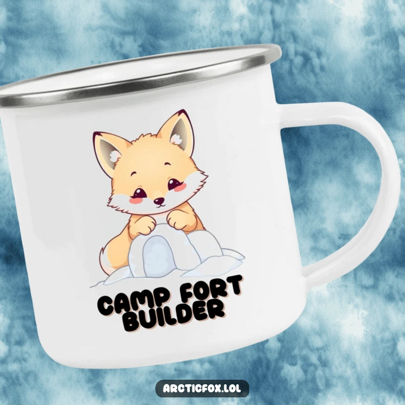 Funny kawaii arctic fox building a tiny snow fort with its paws, depicted on a cute camping mug.