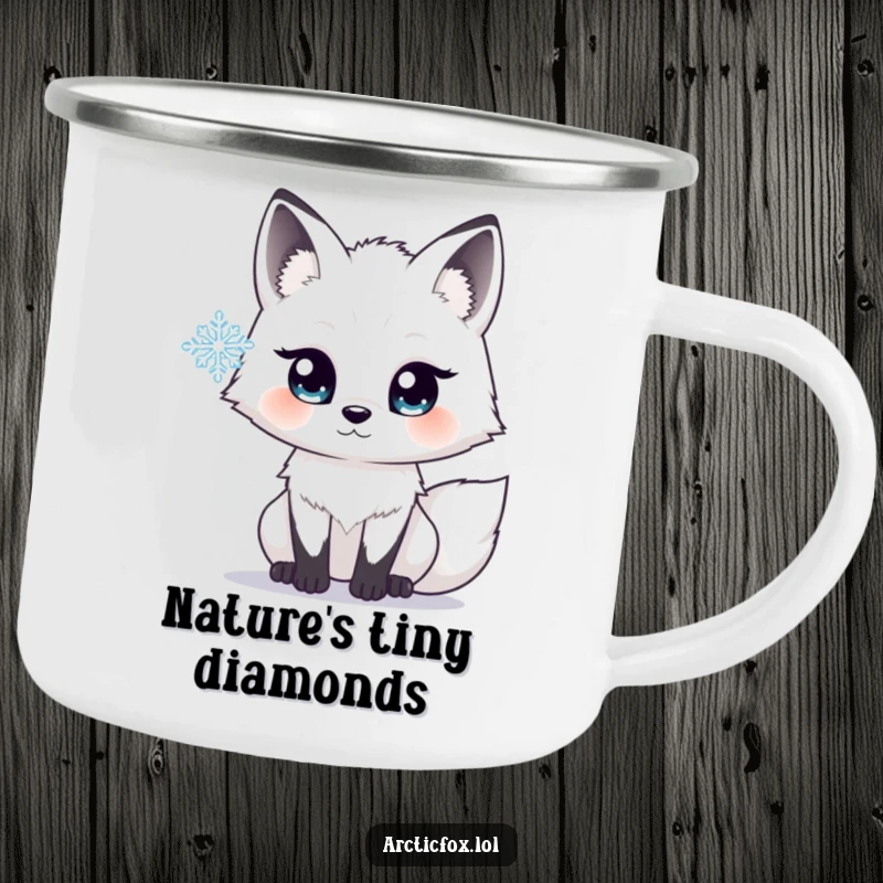Funny camping mug featuring an arctic fox with wide, sparkling eyes, looking in awe at a delicate snowflake.