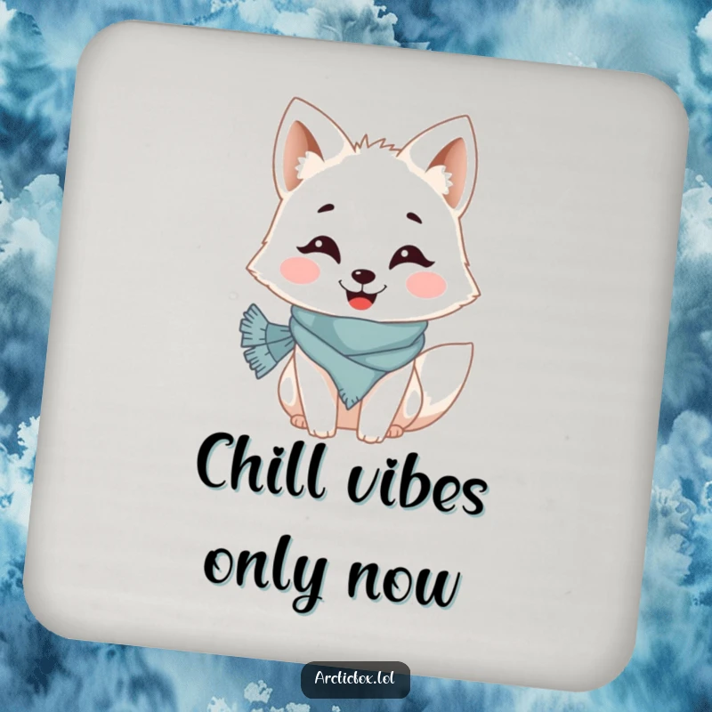 Funny drink coaster featuring a whimsical Arctic fox with a big grin and a tiny scarf, protecting tables from condensation.