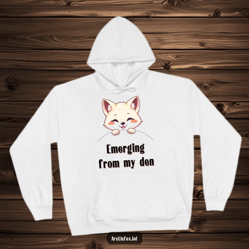 Funny Arctic fox hoodie, showing a fox peeking over snow with a bright smile, offering cozy warmth and fun.
