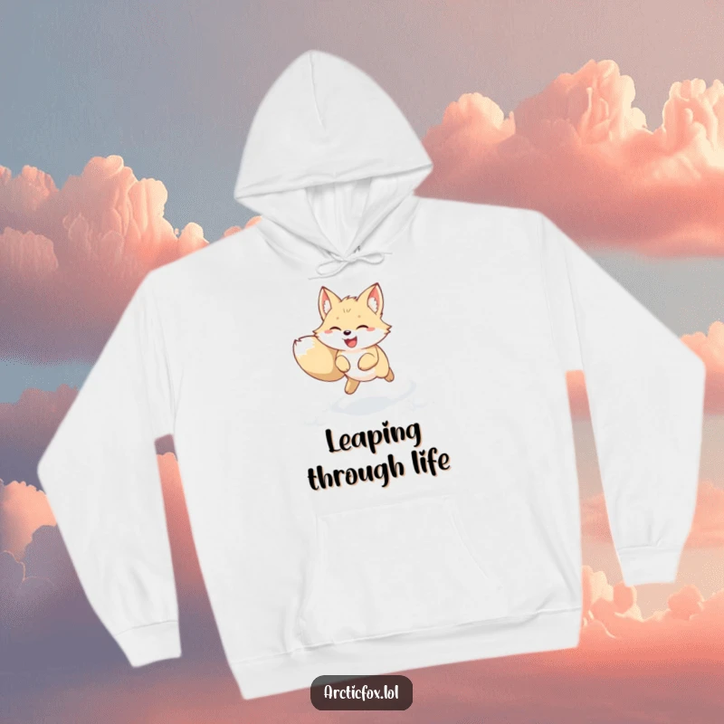 Funny kawaii arctic fox hoodie showing a joyful creature leaping through fresh snow with perked ears. Cozy and cute winter animal design, great funny gift.