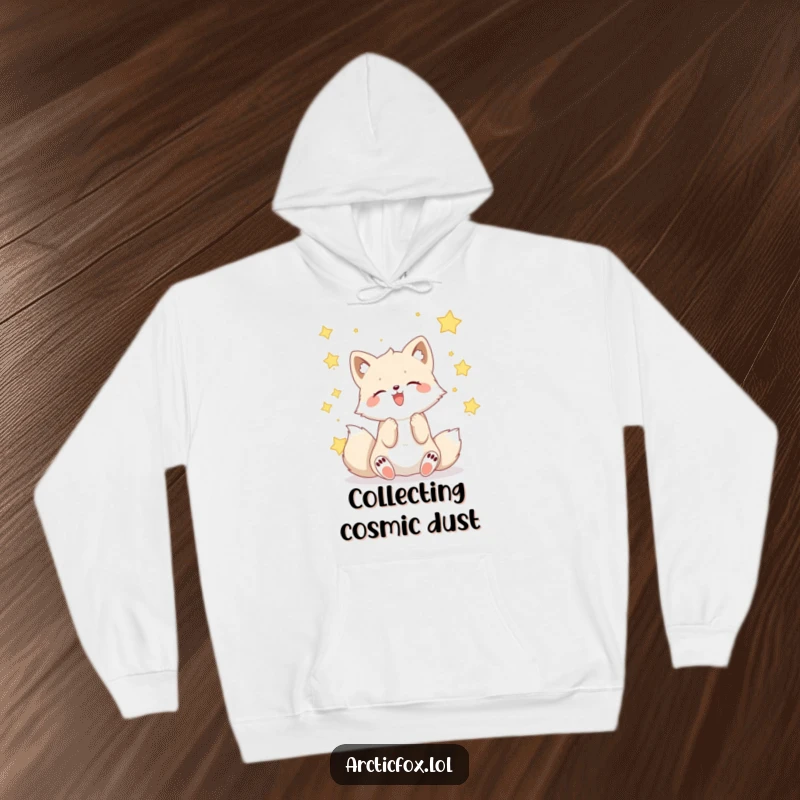 Funny Kawaii arctic fox catching falling stars, a warm and humorous hoodie.