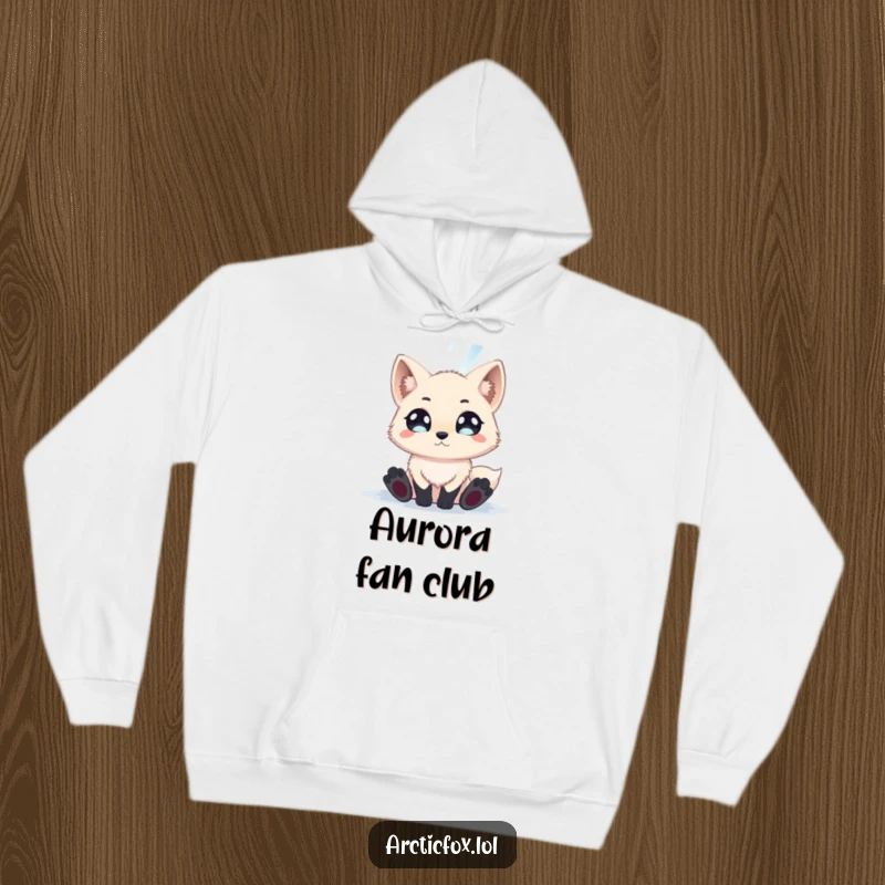 Funny arctic fox with wide, awe-struck eyes watching a spectacular shimmering aurora borealis on a cozy hoodie.
