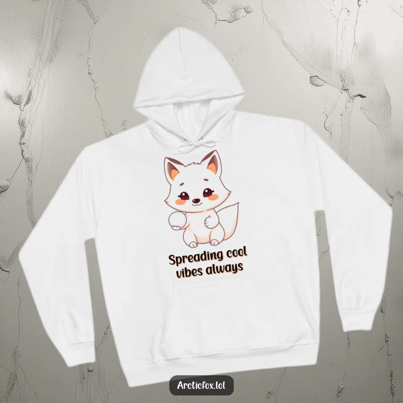 Funny Arctic fox hoodie, showing a friendly fox offering a snowball with a wide, beaming smile, conveying warmth.