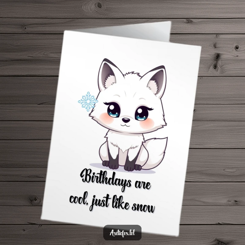 Free Printable Birthday Card: Arctic fox with huge, sparkling eyes mesmerized by a delicate, falling snowflake.