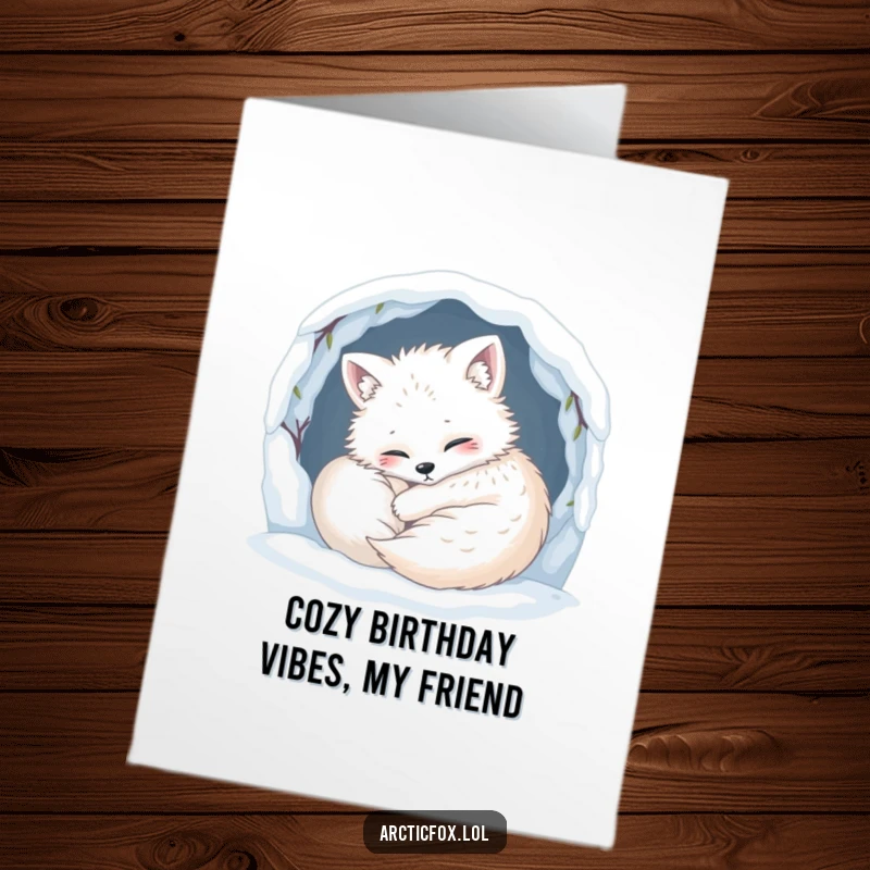 Funny Free Printable Birthday Card: A content arctic fox curled up cozily inside a snowy den.
