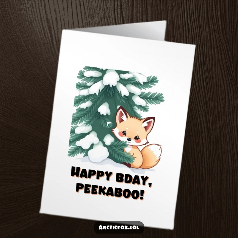 Funny Free Printable Birthday Card: Curious arctic fox peeking out from behind a large, snow-dusted evergreen.