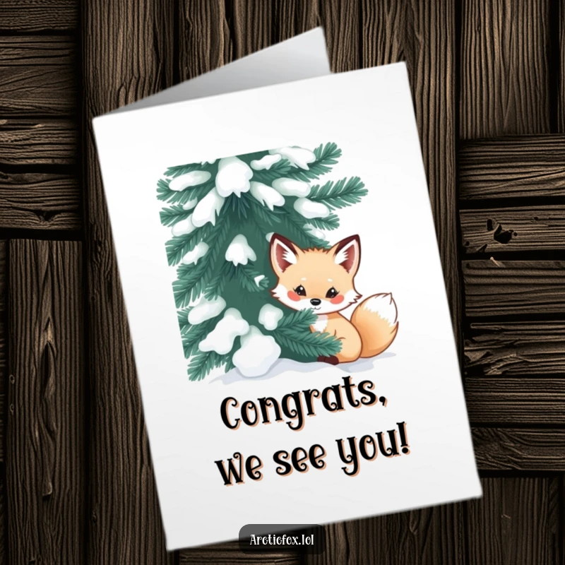 Funny Free Printable Congratulations Card: Curious arctic fox peeking out from behind a large, snow-dusted evergreen.