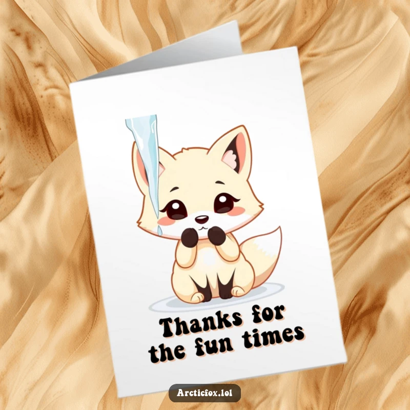 Funny Free Printable Thank You Card featuring an arctic fox gleefully batting at a suspended icicle.