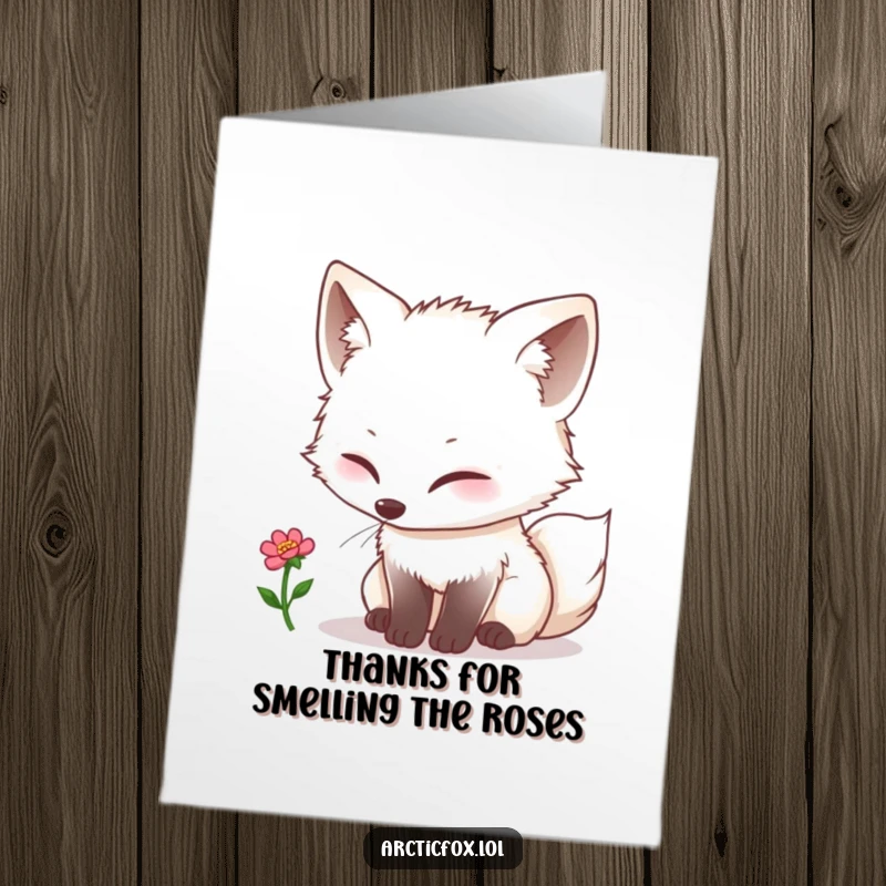Funny Free Printable Thank You Card: A kawaii arctic fox curiously sniffs a tiny bloom, expressing thanks with quiet charm.