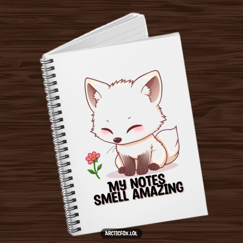 Funny kawaii arctic fox curiously sniffing a tiny single bloom, depicted on the cover of a charming notebook.