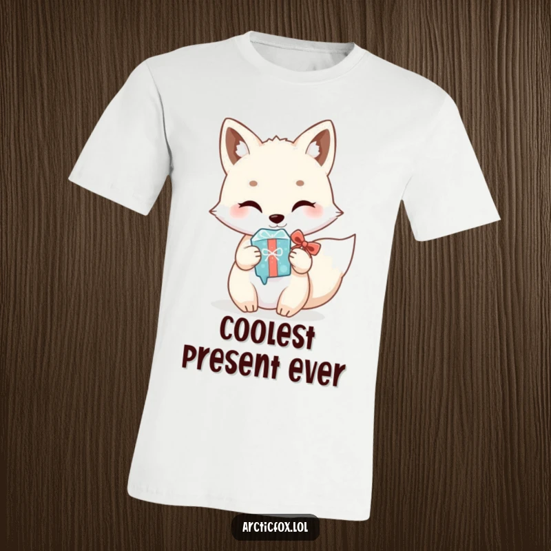 Funny Kawaii Arctic Fox T-Shirt: Adorable white fox offering a shiny icicle like a gift, a cute and comical winter presentation.
