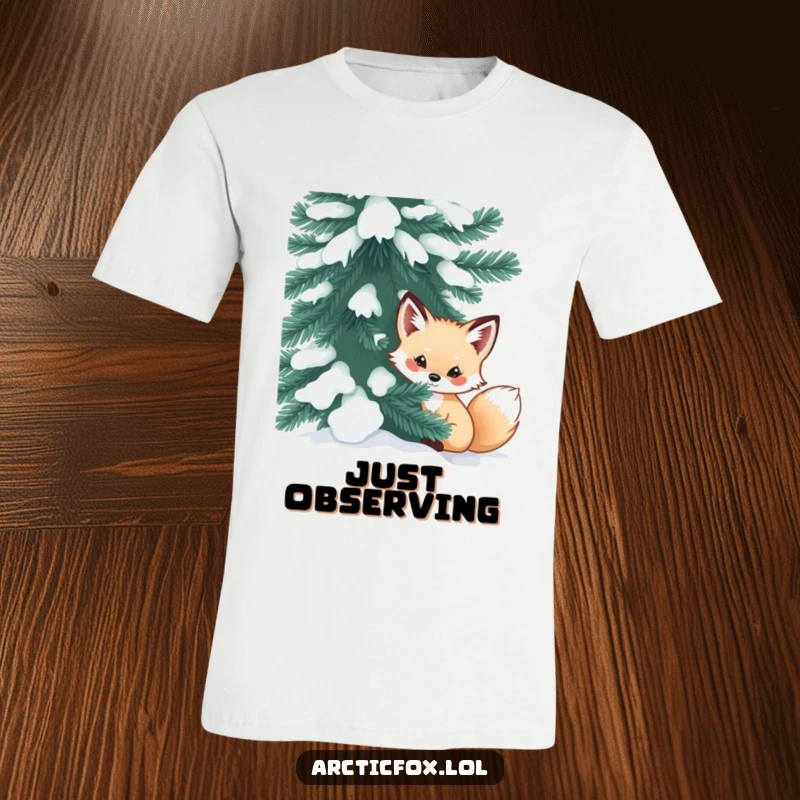 Funny arctic fox t-shirt featuring a curious creature peeking from behind a snow-dusted evergreen, conveying a sense of playful mystery.