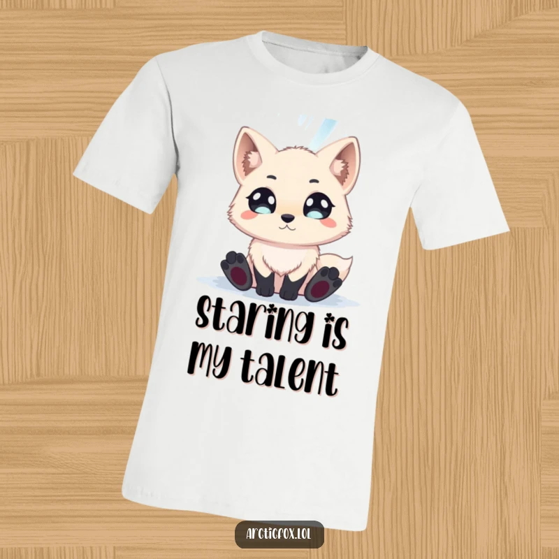 Funny arctic fox with wide eyes stares in amazement at the stunning, colorful aurora borealis on a t-shirt.