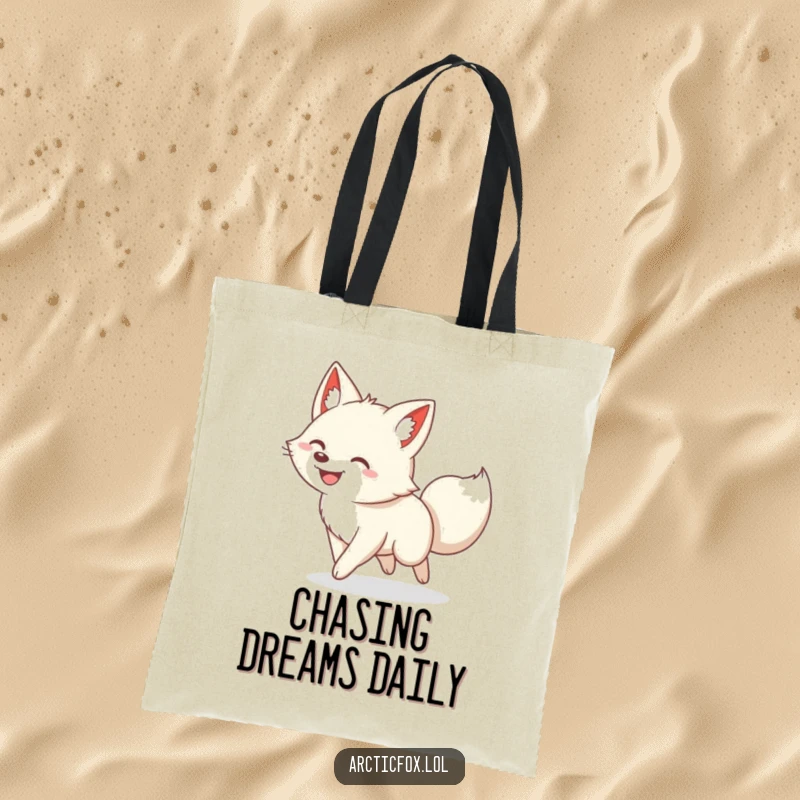 Funny tote bag featuring a delightfully grinning arctic fox energetically chasing its own tail in a humorous cycle.