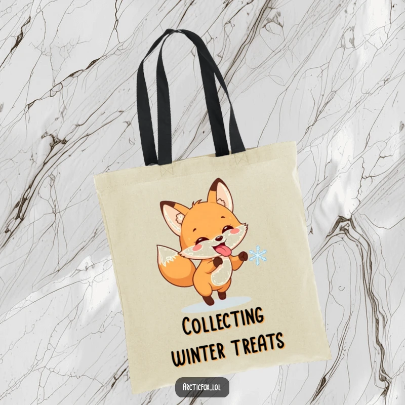 Funny tote bag featuring a fox with its tongue out, joyfully pursuing a falling snowflake against a winter backdrop.