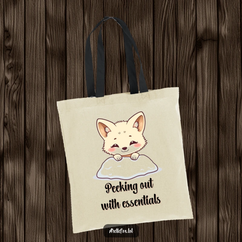 Funny arctic fox tote bag featuring a smiling creature playfully peeking from behind a snowy mound. Cute and humorous winter animal accessory, great funny gift.